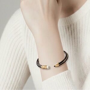 Plunder Pencil Shaped Elegant Black and Gold Open Cuff Bracelet.